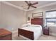 Bedroom featuring a queen-sized bed, neutral tones, and natural light at 1097 Eden Isle Ne Dr, St Petersburg, FL 33704