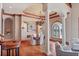 Formal dining room featuring water views and decorative chandelier at 1097 Eden Isle Ne Dr, St Petersburg, FL 33704