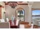 Dining room featuring large window with serene water view at 1097 Eden Isle Ne Dr, St Petersburg, FL 33704