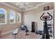 Bright exercise room with workout equipment, including free weights and a stationary bike at 1097 Eden Isle Ne Dr, St Petersburg, FL 33704
