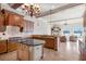 Spacious kitchen with center island, granite countertops, and lake view at 1097 Eden Isle Ne Dr, St Petersburg, FL 33704