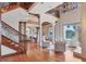 Beautiful living room with hardwood floors and water views at 1097 Eden Isle Ne Dr, St Petersburg, FL 33704
