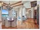 Open concept living room with fireplace and water views at 1097 Eden Isle Ne Dr, St Petersburg, FL 33704