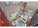 Stunning living room with an elegant fireplace and an ornate chandelier at 1097 Eden Isle Ne Dr, St Petersburg, FL 33704
