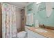Cozy bathroom with updated shower, vanity, and tile accents at 19725 Gulf Blvd # 405, Indian Shores, FL 33785