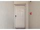 Condo front door with electronic lock, unit number and painted facade at 19725 Gulf Blvd # 405, Indian Shores, FL 33785