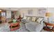 Comfortable living room featuring a stylish sectional sofa and nautical-themed decor at 19725 Gulf Blvd # 405, Indian Shores, FL 33785