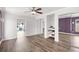 Spacious bedroom with closet, new flooring, shelving, and a view into backyard at 210 Lee St, Oldsmar, FL 34677