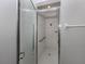 Clean bathroom featuring a tiled shower enclosure with a clear glass door and chrome hardware at 24156 Buckingham Way, Punta Gorda, FL 33980