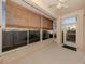 Bright sunroom with multiple windows, woven shades, and a ceiling fan for comfort at 24156 Buckingham Way, Punta Gorda, FL 33980