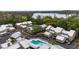 Community aerial view showing the pool and landscaping near a scenic lake at 3406 Waterbridge Dr, Tampa, FL 33618