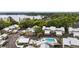 Aerial view of the community showcasing a natural lake and lush surroundings at 3406 Waterbridge Dr, Tampa, FL 33618