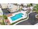 Relaxing community pool area featuring a sundeck, shaded pavilion, and well-kept landscaping at 3406 Waterbridge Dr, Tampa, FL 33618