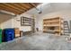 This garage boasts built-in shelving units for optimal organization and storage capacity at 7602 S Desoto St, Tampa, FL 33616