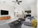 Inviting living room features an open layout, tile flooring, neutral colors, and seamless flow to the dining and kitchen areas at 7602 S Desoto St, Tampa, FL 33616