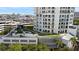Stunning aerial view of building with rooftop garden and surrounding cityscape at 1209 E Cumberland Ave # 505, Tampa, FL 33602