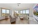 Bright living room with floor-to-ceiling windows and gorgeous city views at 1209 E Cumberland Ave # 505, Tampa, FL 33602