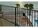 Enjoy this partial Gulf view from your lanai, overlooking a pool and lounging area at 16330 Gulf Blvd # 306, Redington Beach, FL 33708