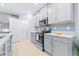 Modern kitchen with an island, stainless steel appliances, and a walk-in pantry at 31349 Cabana Rye Ave, San Antonio, FL 33576