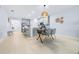 Well-designed kitchen with stainless steel appliances, a breakfast bar, and an adjacent dining area at 31349 Cabana Rye Ave, San Antonio, FL 33576