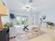 Comfortable living room with a modern sofa, stylish chairs, and bright, airy ambiance at 31349 Cabana Rye Ave, San Antonio, FL 33576