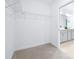 Walk-in closet featuring a carpet floor, white walls, and wire shelving at 31349 Cabana Rye Ave, San Antonio, FL 33576
