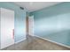 Bedroom with blue walls, carpeted flooring, and a closet at 6170 7Th N Ave, St Petersburg, FL 33710