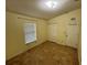 Bedroom featuring neutral paint, tile flooring, and closet for ample storage at 6190 107Th N Ave, Pinellas Park, FL 33782