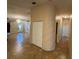 Open foyer with neutral paint, tile flooring and a chandelier at 6190 107Th N Ave, Pinellas Park, FL 33782