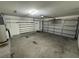 A spacious garage provides storage with built-in shelving and ample space at 6190 107Th N Ave, Pinellas Park, FL 33782