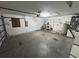 An open garage features ample space, with storage and a water heater at 6190 107Th N Ave, Pinellas Park, FL 33782
