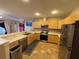 Well-equipped kitchen with stainless steel appliances and ample counter space at 6190 107Th N Ave, Pinellas Park, FL 33782