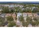 Aerial view of residential neighborhood, featuring a home with a gray roof at 6324 Magnolia Trails Ln, Gibsonton, FL 33534