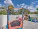 Backyard with trampoline and playhouse at 6324 Magnolia Trails Ln, Gibsonton, FL 33534