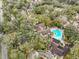 Wide angle aerial view of the community, showcasing buildings, landscaping, parking, and pool area at 8609 Mallard Reserve Dr # 103, Tampa, FL 33614