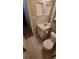 Cozy bathroom with patterned tile floor, modern fixtures, and a vanity with storage at 8609 Mallard Reserve Dr # 103, Tampa, FL 33614