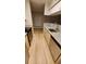 Beautiful kitchen showcasing granite countertops, stainless steel appliances and blond wood cabinetry at 8609 Mallard Reserve Dr # 103, Tampa, FL 33614