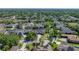 An aerial view of the home and the surrounding neighborhood at 1111 Carriage Park Dr, Valrico, FL 33594
