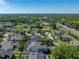 Beautiful home features a screen enclosed pool, and is surrounded by lush trees at 1111 Carriage Park Dr, Valrico, FL 33594