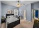 Bedroom featuring a desk and ensuite bathroom for convenience at 1111 Carriage Park Dr, Valrico, FL 33594