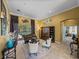 Cozy living room features a view of the pool, and built-in display cabinet at 1111 Carriage Park Dr, Valrico, FL 33594