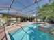 A large screened pool and patio provide the perfect Florida retreat at 1111 Carriage Park Dr, Valrico, FL 33594