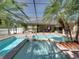 Enjoy the pool and spa in the privacy of your backyard oasis at 1111 Carriage Park Dr, Valrico, FL 33594