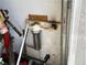 Garage showing water filter and other house maintenance items at 1530 Davenport Dr, New Port Richey, FL 34655