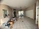 Open living room with sliding glass doors and view of the patio at 1530 Davenport Dr, New Port Richey, FL 34655