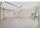 Clean and bright garage space with water heater and ample room for storage or parking at 15555 Martinmeadow Dr, Lithia, FL 33547