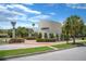Park Square building with bike racks, sidewalk and surrounding landscaping, showcasing community amenities at 15555 Martinmeadow Dr, Lithia, FL 33547