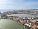 Aerial view of waterfront location highlighting vacant lot, with easy access to canals and the ocean at 211 Bath Club N Blvd, North Redington Beach, FL 33708