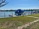 View of boat in lift and waterfront area at 211 Bath Club N Blvd, North Redington Beach, FL 33708