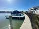 View of dock, boat and waterfront access at 211 Bath Club N Blvd, North Redington Beach, FL 33708